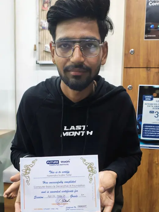 Narendra Patel holding his Future Vision certificate